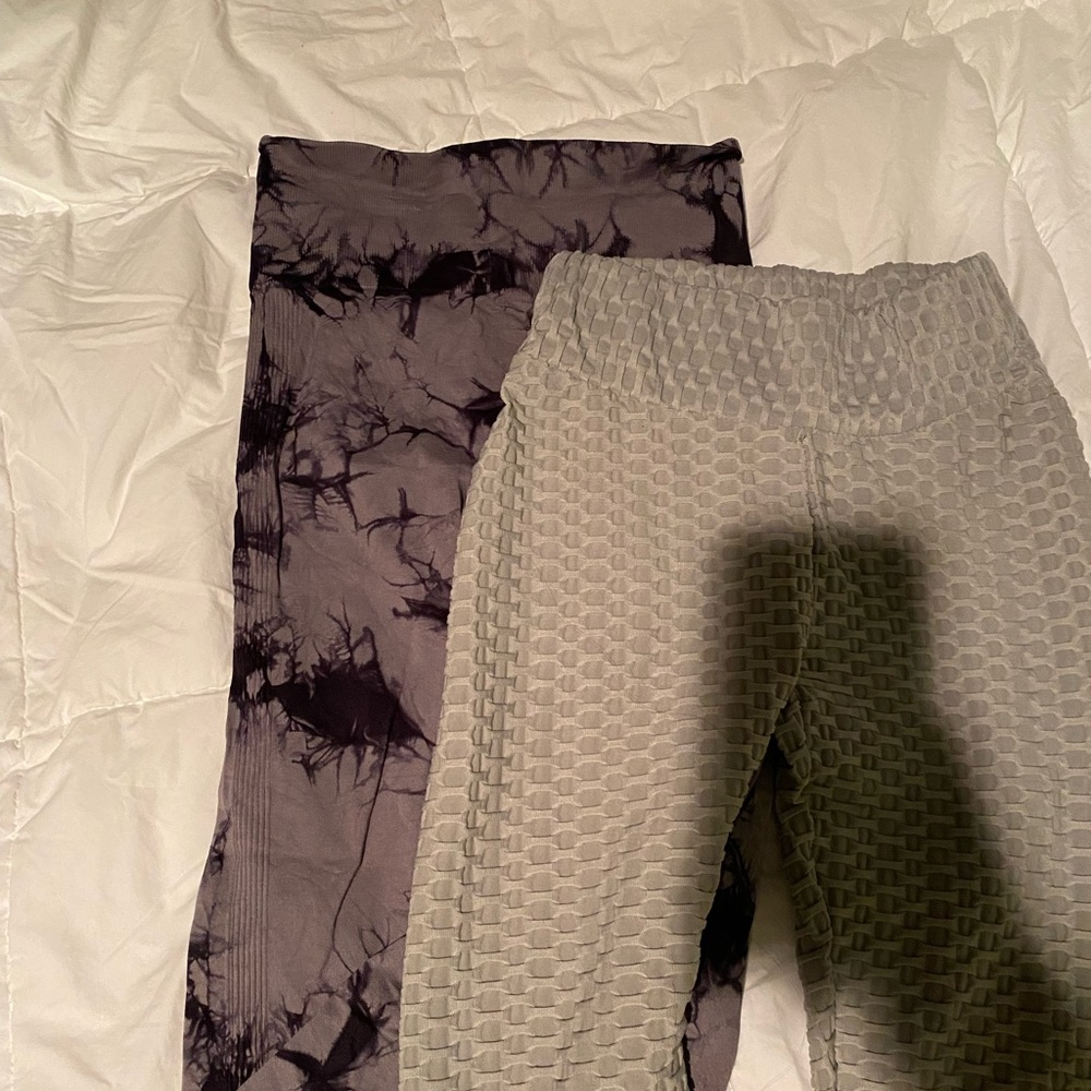 two pairs of leggings